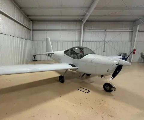 N492VT, a white Van's RV-12iS, parked inside a hangar